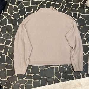 I am selling this sweater because it’s just sitting in my closet going to waste